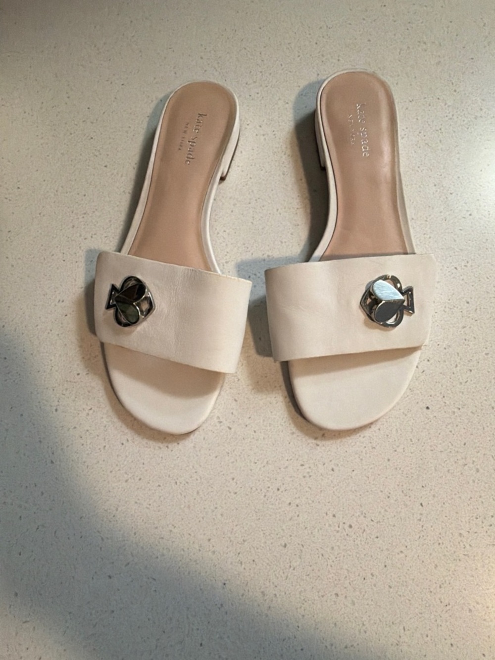 kate spade Cream Slide Sandals with Gold Logo Accent